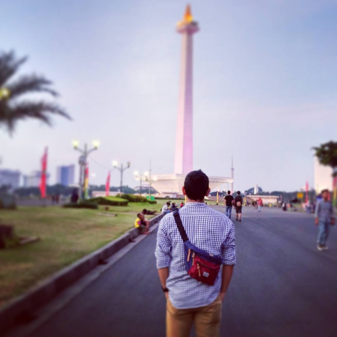 men in front of Monas jakarta